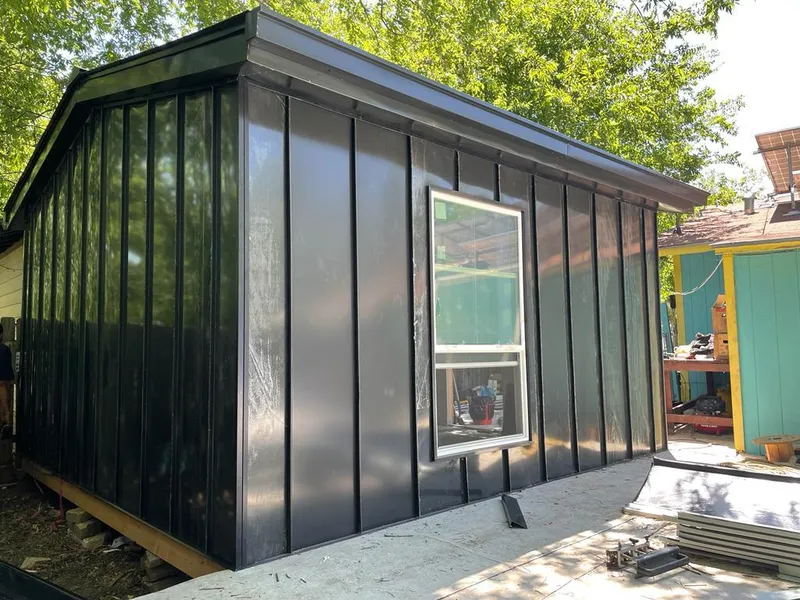 Black standing seam metal wall panels for Roof Inspection in Gilbert