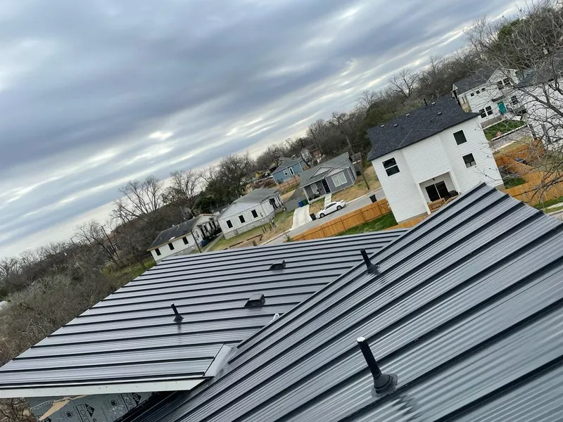 Standing seam metal roof panels with vents for Skylight Repair in Gilbert